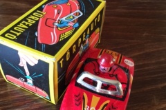 253. TORPEAUTO FIRE CHIEF PUSH HEAD CAR TOY